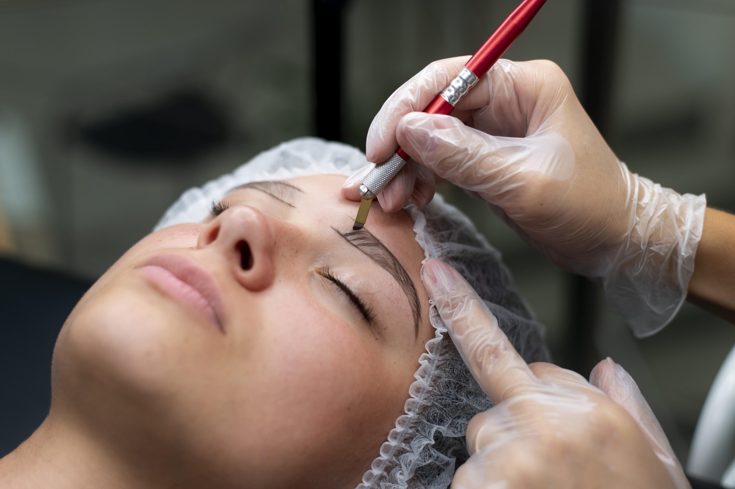 beautician-doing-microblading-procedure-young-woman beautician-doing-microblading-procedure-young-woman