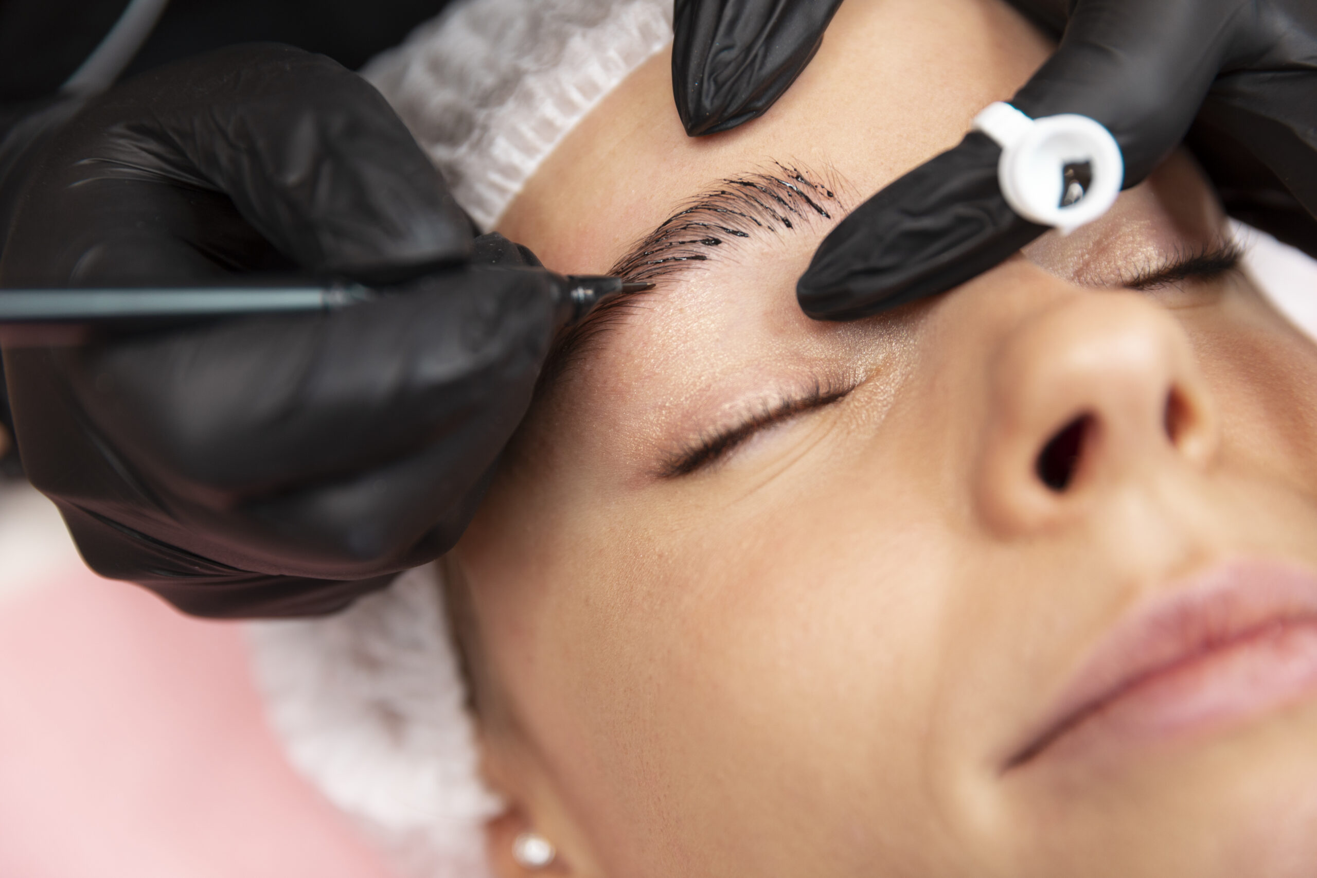 beautiful-young-woman-going-through-microblading-treatment beautiful-young-woman-going-through-microblading-treatment