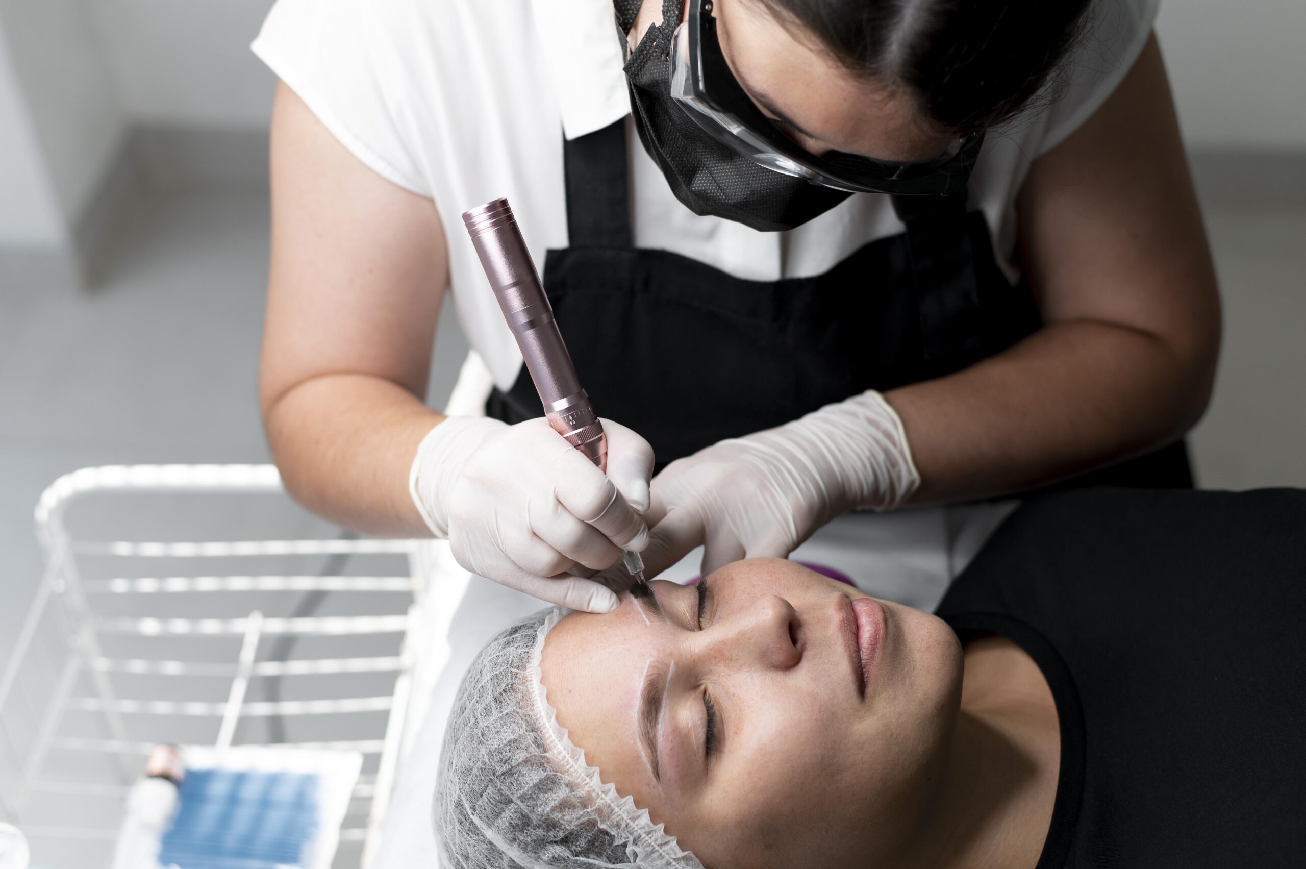 young-woman-going-through-microblading-treatment-2 young-woman-going-through-microblading-treatment-2