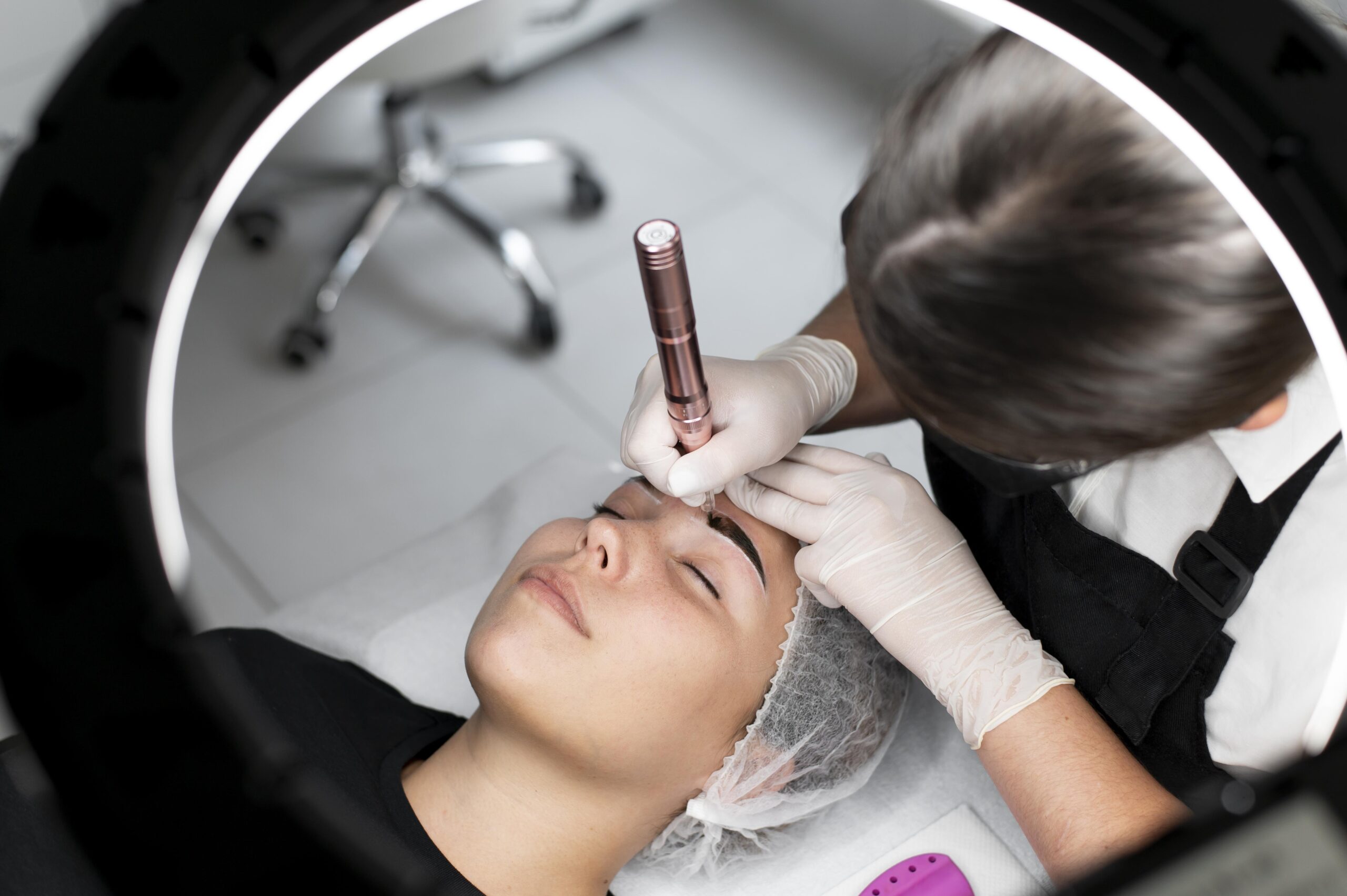 young-woman-going-through-microblading-treatment young-woman-going-through-microblading-treatment